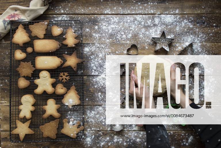 Woman s hands kneading dough for gingerbread cookies model released Symbolfoto SKCF00469