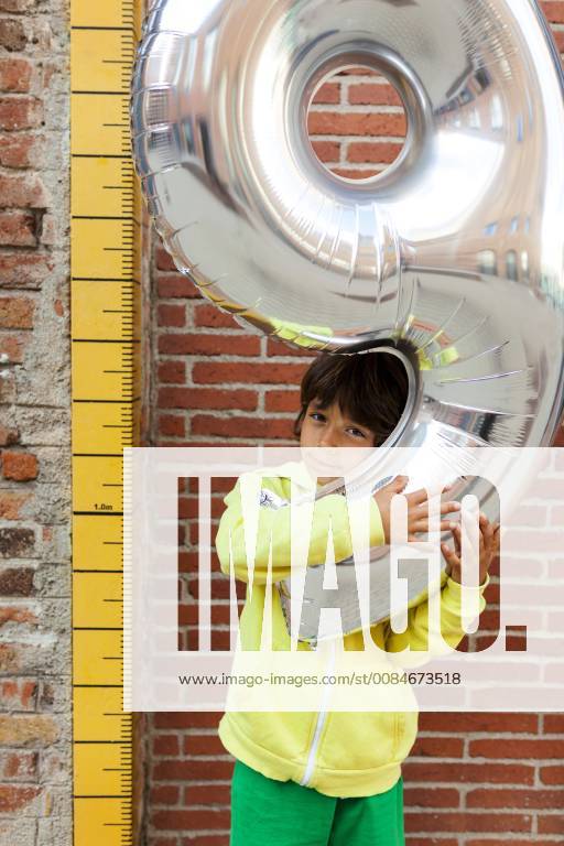Portrait of boy with silver balloon model released Symbolfoto VABF01615