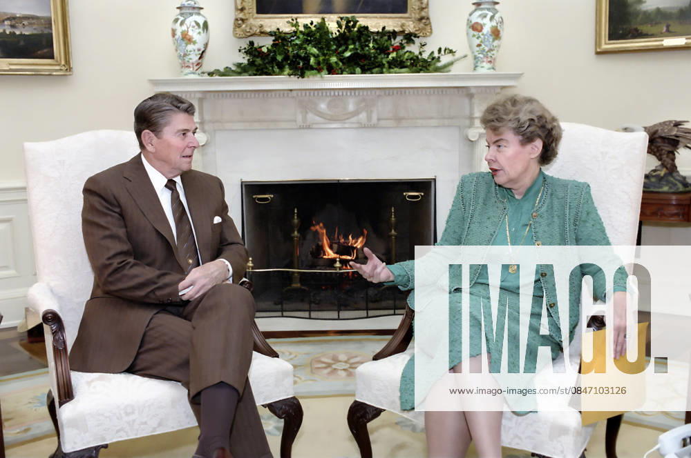 U.S. President Ronald Reagan meeting with U.S. Ambassador to the United Nations Jeane Kirkpatrick in the Oval Office of the White House, Washington, D.C., USA, President Ronald Reagan White House Photographic Office