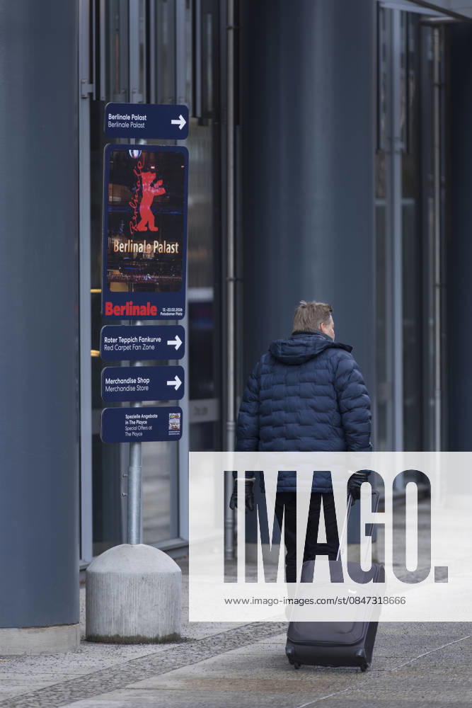 Berlinale, construction work at Potsdamer Platz, Berlin, 11 02 2026 A man with a suitcase passes a signpost to the Berlinale before the opening of the 76th Berlinale at the Theater am Potsdamer Platz in Berlin on 11 02 2026 The film festival will take place from 12 22 February 2026 Berlin Theater am Potsdamer Platz