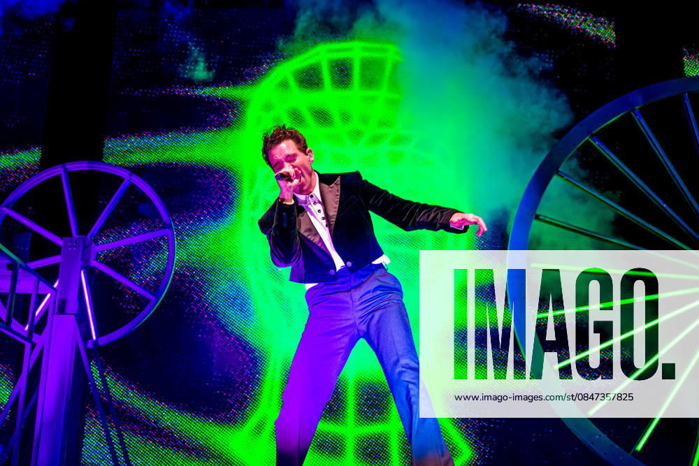 Mika (MICHAEL HOLBROOK PENNIMAN JR) performs on stage at the AO Arena, Manchester, UK, during his Spinning Out tour, delivering a flamboyant, high-energy set to a packed arena crowd. Manchester United Kingdom - ZUMAp211 20260211_aap_p211_008