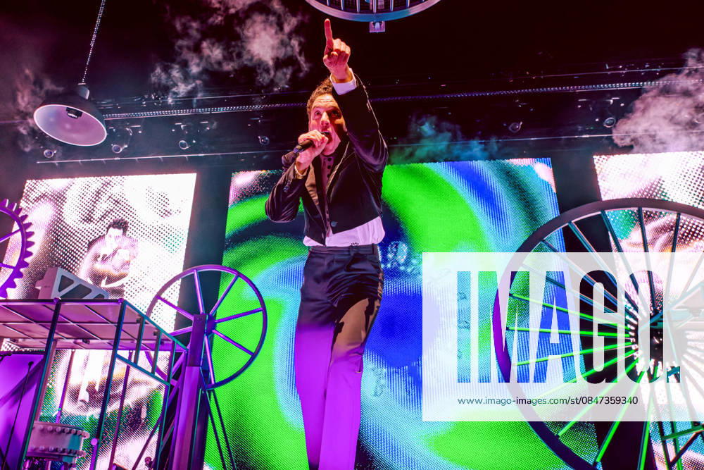 Mika (MICHAEL HOLBROOK PENNIMAN JR) performs on stage at the AO Arena, Manchester, UK, during his Spinning Out tour, delivering a flamboyant, high-energy set to a packed arena crowd. Manchester United Kingdom - ZUMAp211 20260211_aap_p211_019