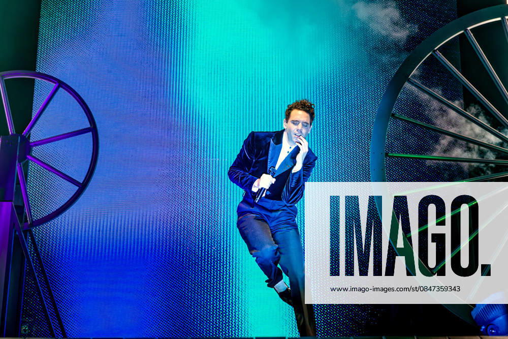 Mika (MICHAEL HOLBROOK PENNIMAN JR) performs on stage at the AO Arena, Manchester, UK, during his Spinning Out tour, delivering a flamboyant, high-energy set to a packed arena crowd. Manchester United Kingdom - ZUMAp211 20260211_aap_p211_021