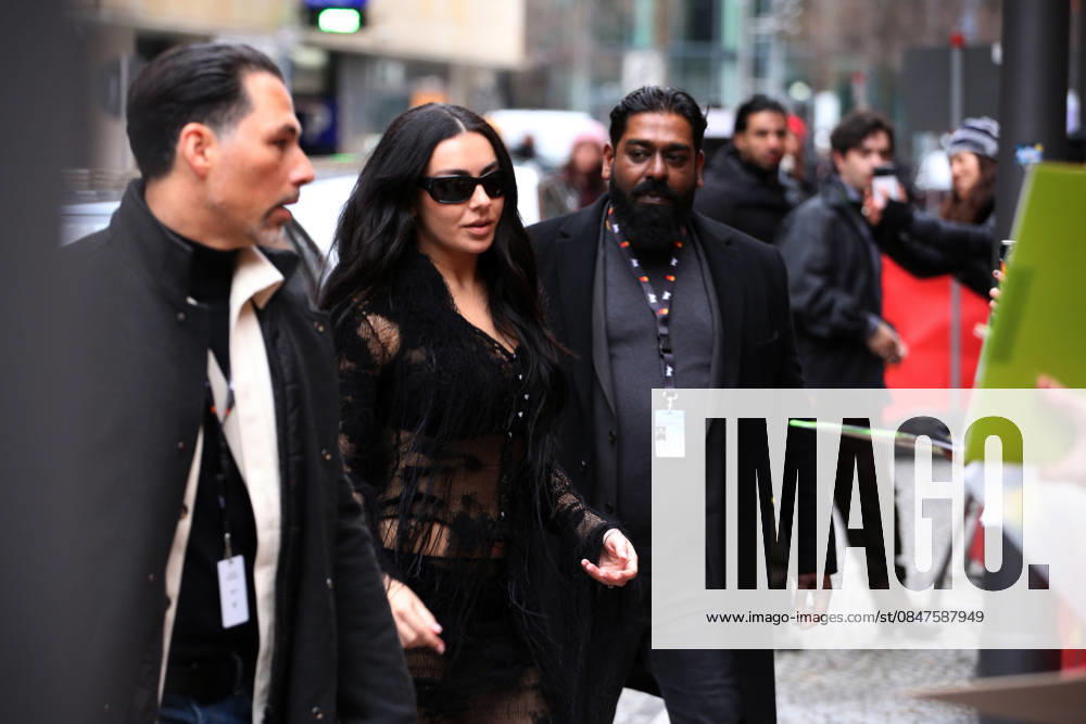 British singer-songwriter and actress CHARLI XCX (C) arrives at the the 76th Berlin International Film Festival (Berlinale), which is Europe s first major film festival of the year, in Berlin. The festival runs from February 12 to 22, 2026. Berlin Germany - ZUMAf146 20260214_zip_f146_053
