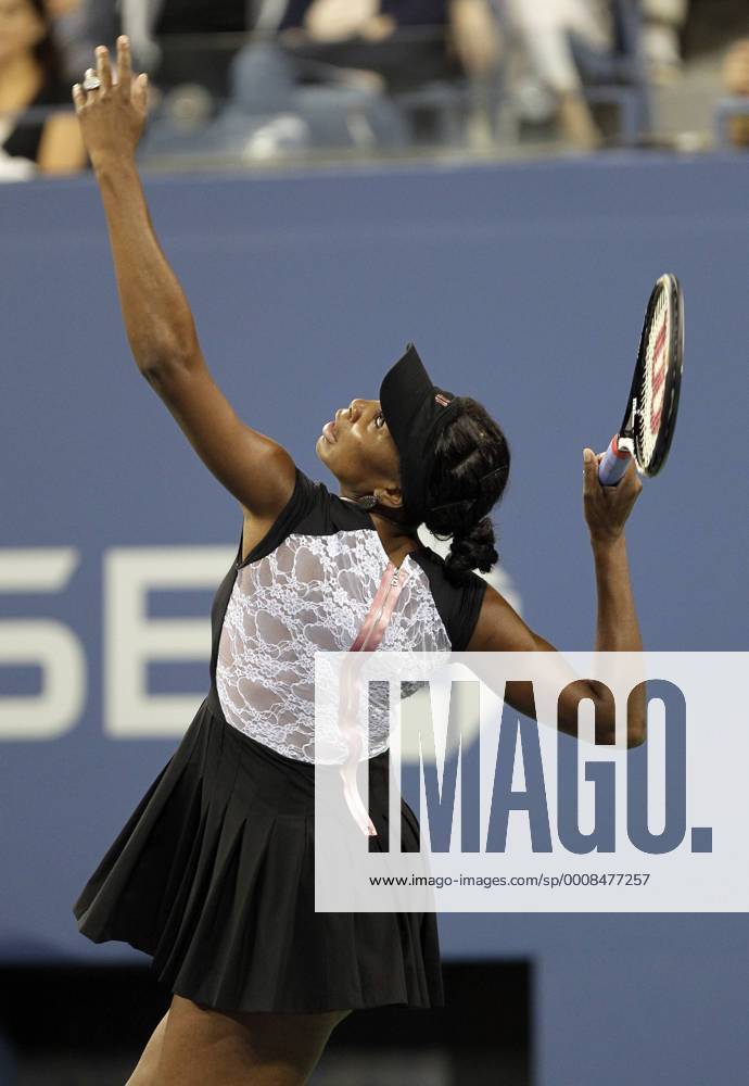 Venus Williams serves on day in Arthur Ashe Stadium at the U.S. Open Tennis Championships Stadium at the Billie Jean King National Tennis Center in New York City on August 29, 2011. NYP20110829128