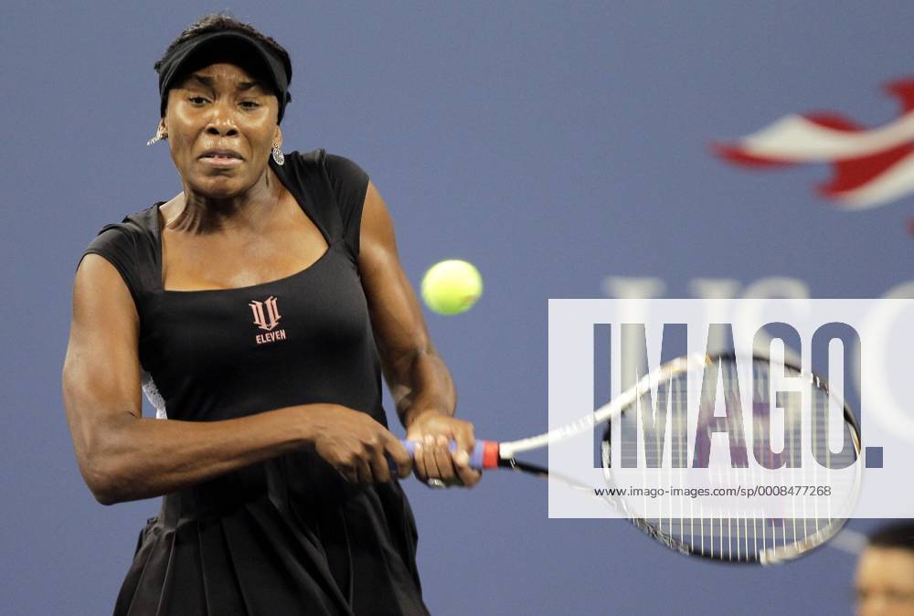 Venus Williams hits backhand in her straight sets victory on day in Arthur Ashe Stadium at the U.S. Open Tennis Championships Stadium at the Billie Jean King National Tennis Center in New York City on August 29, 2011. NYP20110829129
