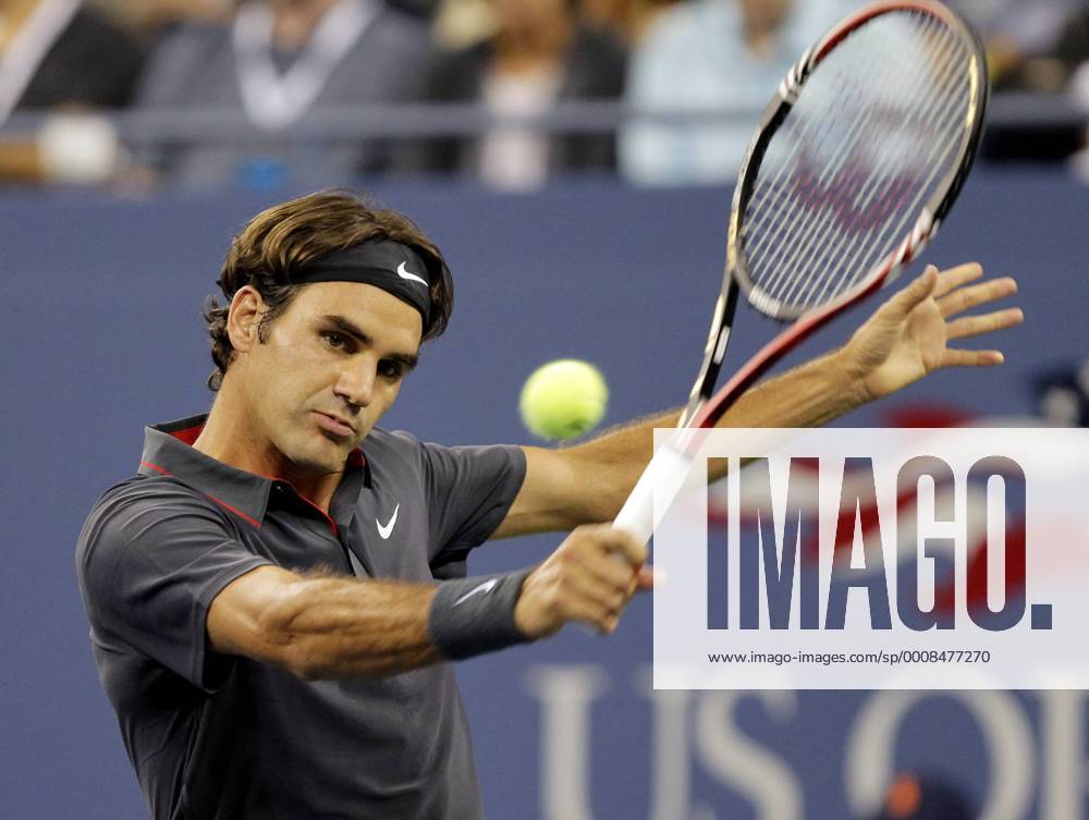 Roger Federer of Switzerland hits backhand in his match on day in Arthur Ashe Stadium at the U.S. Open Tennis Championships Stadium at the Billie Jean King National Tennis Center in New York City on August 29, 2011. NYP20110829136