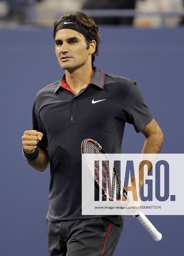 Roger Federer of Switzerland pumps his fist after match point in his straight sets victory on day in Arthur Ashe Stadium at the U.S. Open Tennis Championships Stadium at the Billie Jean King National Tennis Center in New York City on August 29, 2011. NYP20110829141