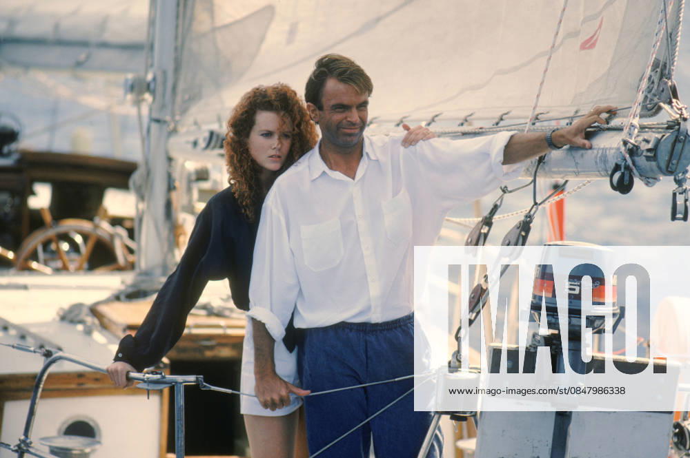 1989 - Dead Calm - Movie Set RELEASE DATE: April 07, 1989. MOVIE TITLE: Dead Calm. STUDIO: Kennedy Miller Productions. PLOT: An Australian couple take a sailing trip in the Pacific to forget about a terrible accident. While on the open sea, in dead calm, they come across a ship with one survivor who is not at all what he seems. PICTURED: NICOLE KIDMAN as Rae Ingram and SAM NEILL as John Ingram. Gold Coast Queensland Australia