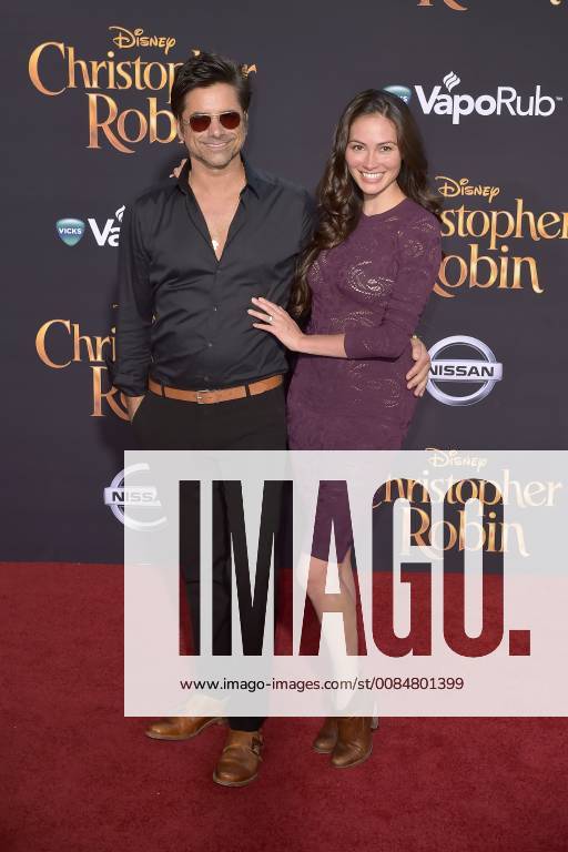 John Stamos with wife Caitlin McHugh at the premiere of the movie Christopher Robin at Walt Disney Studios Burbank 30 07 2018 Foto:xD.xStarbuckx xFuturexImage