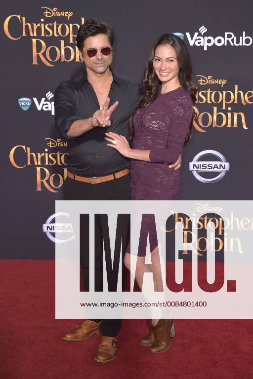 John Stamos with wife Caitlin McHugh at the premiere of the movie Christopher Robin at Walt Disney Studios Burbank 30 07 2018 Foto:xD.xStarbuckx xFuturexImage