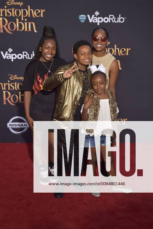 Issac Ryan Brown with accompaniment at the premiere of the movie Christopher Robin at Walt Disney Studios Burbank 30 07 2018 Foto:xD.xStarbuckx xFuturexImage