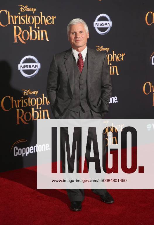 BURBANK, CA - JULY 30: Brigham Taylor, at Premiere Of Disney s Christopher Robin at Walt Disney Studios in Burbank, California on July 30, 2018.