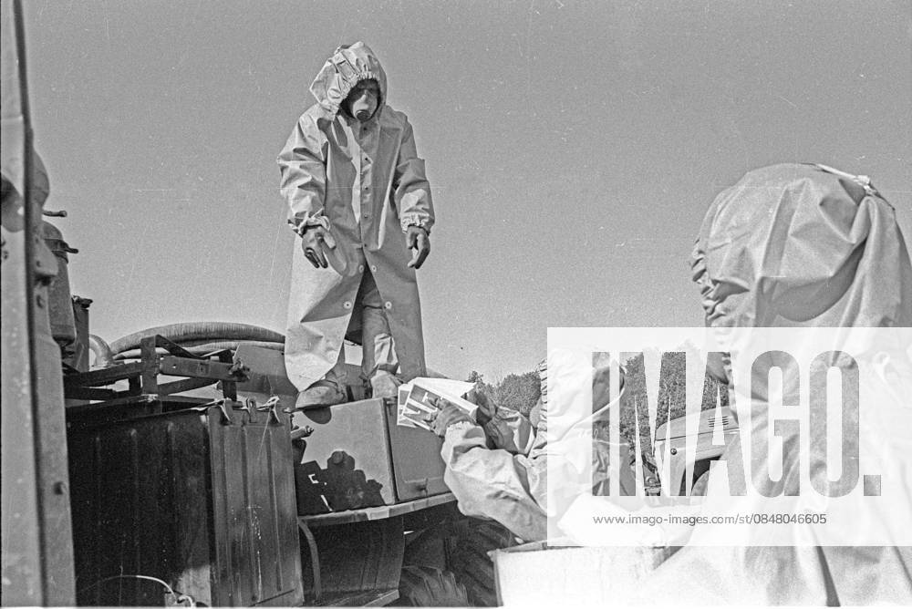 Chernobyl, Ukraine - File Photo Decontamination team members at work.