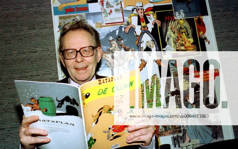 BRU16 - - BRUSSELS, BELGIUM : FILE PICTURE shows comic strip drawer Maurice De Bevere, known as Morris, father of cow-boy Lucky Luke presenting a new issue of Rantanplan. It was announced Thursday 19 July 2001 that Morris died on Tuesday 17 after a fall in Southern France. ROBERTxVANDENxBRUGGE x678393x