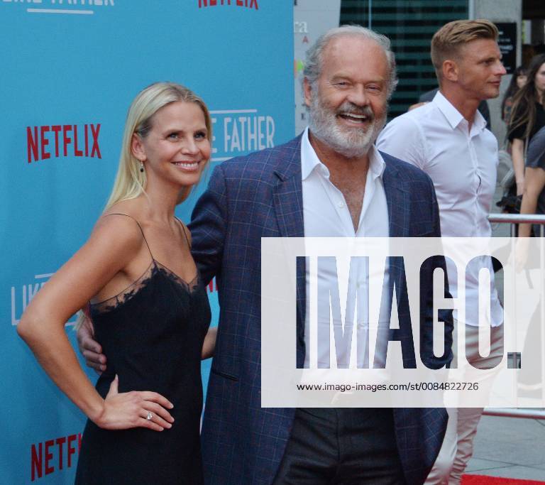 Cast member Kelsey Grammer and his wife Kayte Walsh attend the premiere of the motion picture comedy Like Father at the ArcLight Cinema Dome in the Hollywood section of Los Angeles on July 31, 2018. The storyline follows a workaholic woman who is left at the altar takes her honeymoon trip anyway with her overachieving father who left her mother because he believed his family was holding back his career. LAP2018073114 JIMxRUYMEN