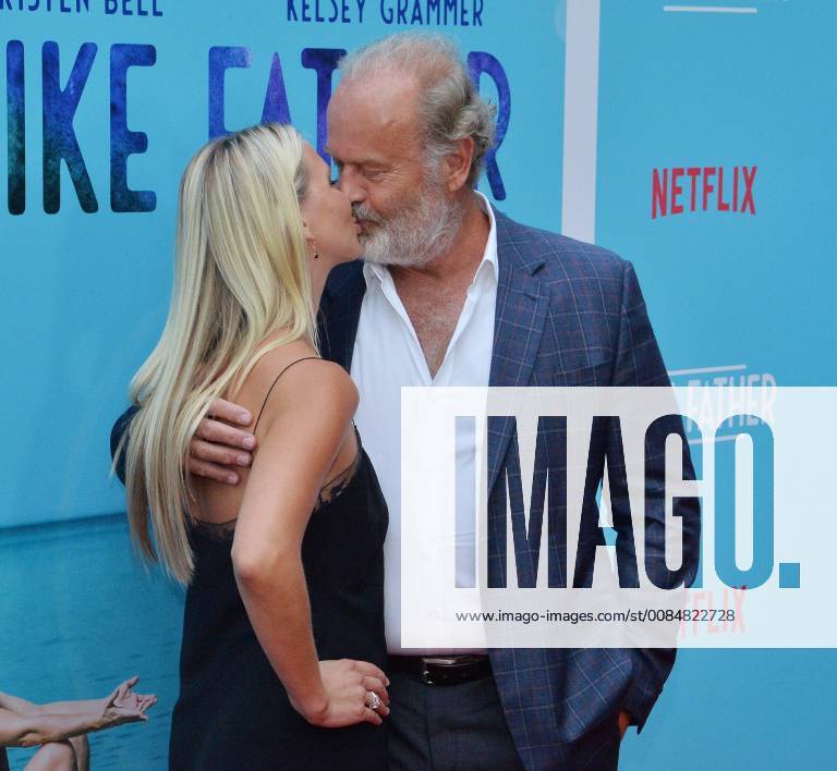 Cast member Kelsey Grammer and his wife Kayte Walsh attend the premiere of the motion picture comedy Like Father at the ArcLight Cinema Dome in the Hollywood section of Los Angeles on July 31, 2018. The storyline follows a workaholic woman who is left at the altar takes her honeymoon trip anyway with her overachieving father who left her mother because he believed his family was holding back his career. LAP2018073116 JIMxRUYMEN