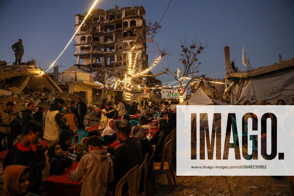 Gaza Ramadan Iftar Amid Rubble Palestinians gather for a mass fast-breaking iftar meal during Muslims holy month of Ramadan amid the rubble of destroyed buildings in the northern Gaza Strip on February 20, 2026. Gaza Gaza Strip Palestine Territories