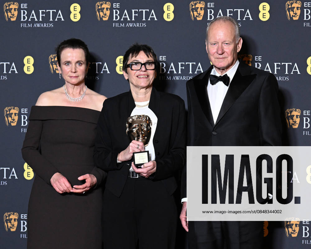 British actress Emily Watson, film producer Clare Binns and Swedish actor Stellan Skarsgard attend the Winners Room at the EE BAFTA Film Awards at the Royal Festival Hall in London, England on Sunday, February 22, 2026. LON202602221111 RUNExHELLESTAD