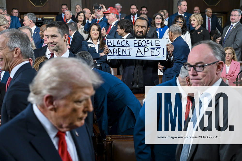 #2 Representative Al Green, Democrat of Texas, holds a sign before President Donald Trump delivers his State of the Union address during a joint session of Congress in the House Chamber at the U.S. Capitol in Washington, DC on Tuesday, February 24, 2026. Dozens of Democrats have boycotted the speech and are attending an alternative rally called the People s State of the Union held on the National Mall. Pool photo by Kenny Holston WAX2026022535 KennyxHolston