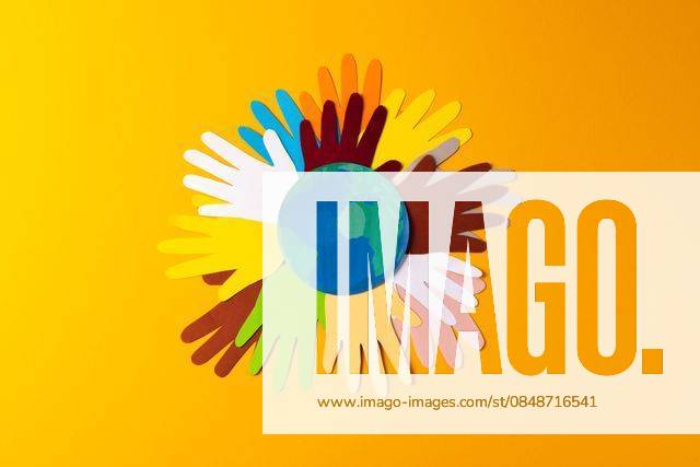 Paper cut out of multi coloured hands and globe with copy space on yellow background, 14.02.2023 06:00:00, 4005148ICCF-230331_2xcreatorid:x179