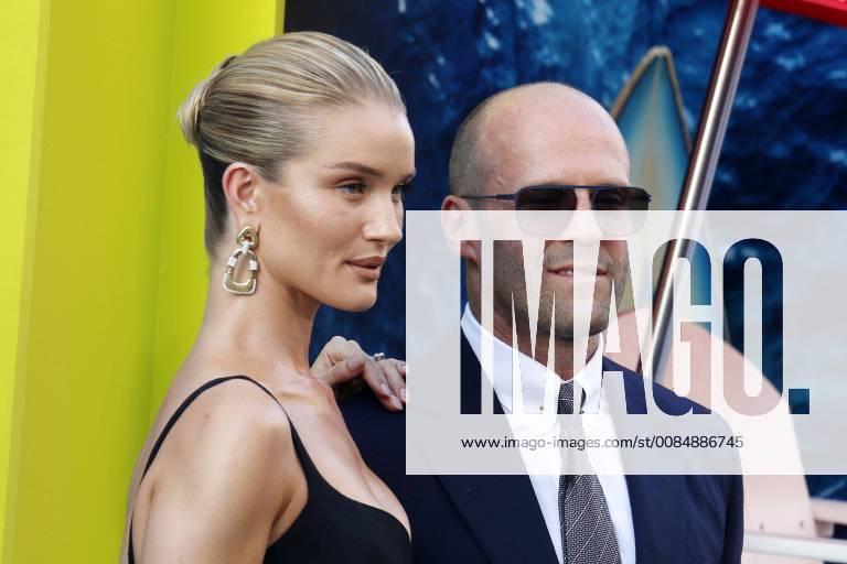 Rosie Huntington Whiteley and Jason Statham at The Meg Film Premiere on 6th Aug 2018 in Hollywood Los Angeles The Meg Film Premiere in Hollywood Los Angeles 2018