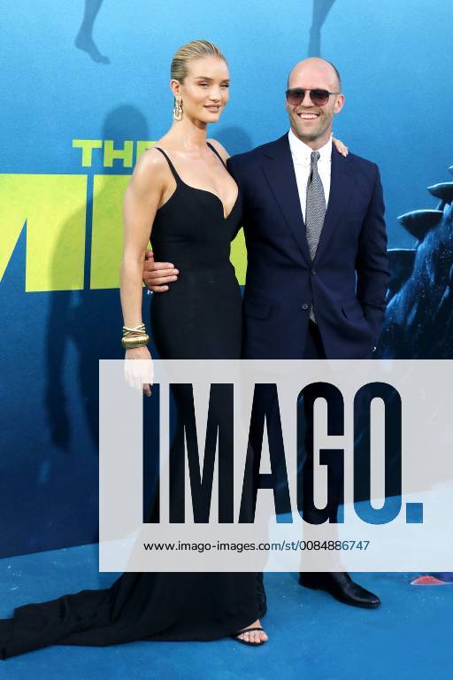 Rosie Huntington Whiteley and Jason Statham at The Meg Film Premiere on 6th Aug 2018 in Hollywood Los Angeles The Meg Film Premiere in Hollywood Los Angeles 2018