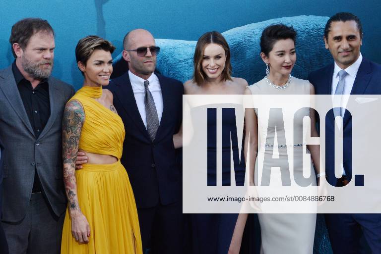 Cast members Rainn Wilson, Ruby Rose, Jason Statham, Jessica McNamee, Li Bingbing and Cliff Curtis (L-R) gather for a photo-op during the premiere of the sci-fi motion picture thriller The Meg at TCL Chinese Theatre in the Hollywood section of Los Angeles on August 6, 2018. Storyline: After escaping an attack by what he claims was a 70-foot shark, Jonas Taylor must confront his fears to save those trapped in a sunken submersible. LAP2018080639 JIMxRUYMEN