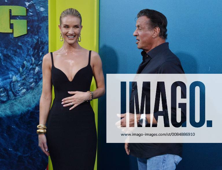 English actress and model Rosie Huntington-Whiteley and actor Sylvester Stallone mingle during the premiere of the sci-fi motion picture thriller The Meg at TCL Chinese Theatre in the Hollywood section of Los Angeles on August 6, 2018. Storyline: After escaping an attack by what he claims was a 70-foot shark, Jonas Taylor must confront his fears to save those trapped in a sunken submersible. LAP2018080650 JIMxRUYMEN