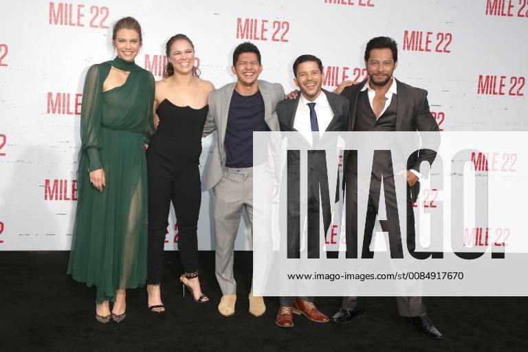 LOS ANGELES, CA - AUGUST 9: Lauren Cohan, Ronda Rousey, Iko Uwais, Carlo Alban and Sam Medina at the Mile 22 premiere at The Regency Village Theatre in Los Angeles, California on August 9, 2018.