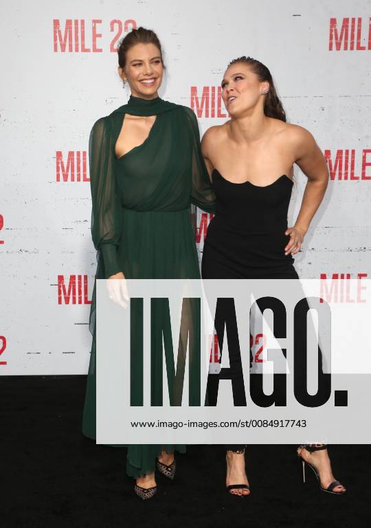 LOS ANGELES, CA - AUGUST 9: Lauren Cohan and Ronda Rousey at the Mile 22 premiere at The Regency Village Theatre in Los Angeles, California on August 9, 2018.
