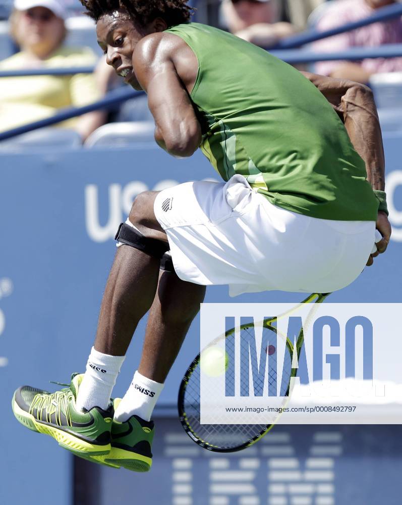 Gael Monfils of France leaps and hits a ball behind him in his match on day 4 in Louis Armstrong Stadium at the U.S. Open Tennis Championships Stadium at the Billie Jean King National Tennis Center in New York City on September 1, 2011. NYP20110901111