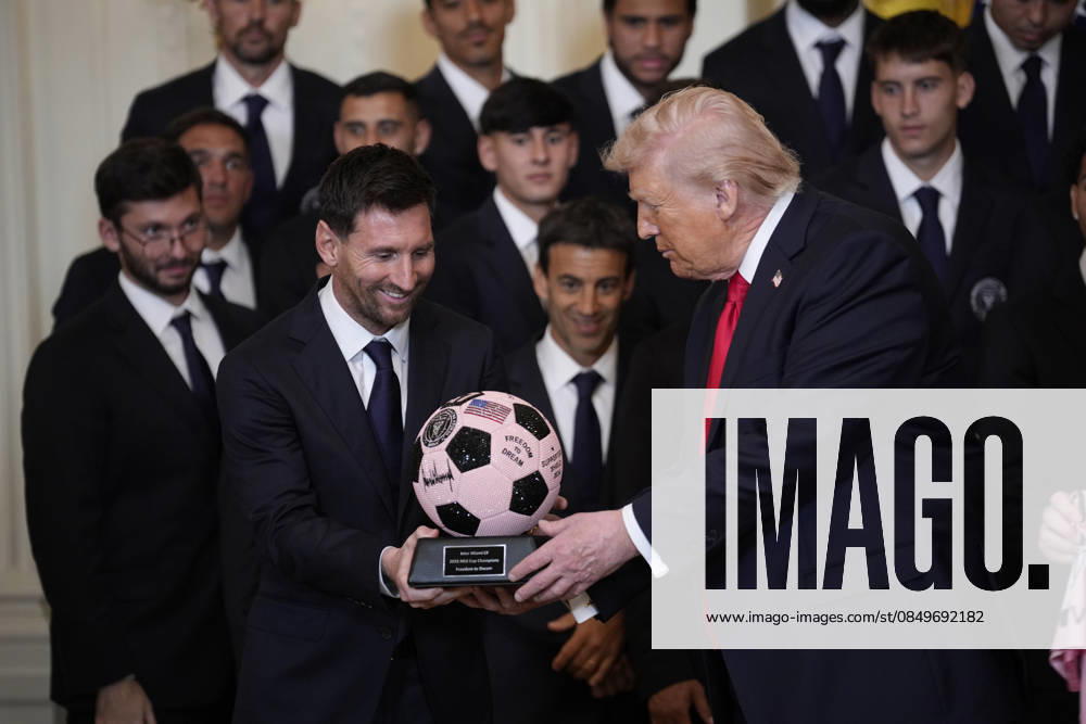 US President Donald Trump holds a soccer ball presented to him by the captain Lionel Messi during an event in the East Room of the White House on Thursday, March 5, 2026 in Washington, DC. WAX202603059898 YurixGripas