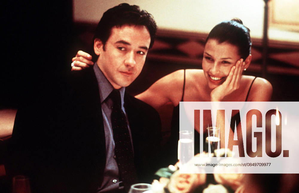 Serendipity Movie Stills Oct 05, 2001; Los Angeles, CA, USA; Actor JOHN CUSACK stars as Jonathan Trager and BRIDGET MOYNAHAN as Halley Buchanan in the Tapestry Films romantic comedy, Serendipity. Los Angeles CA USA
