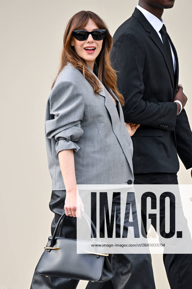 PFW Givenchy Outside Arrivals Elizabeth Olsen arriving at the Givenchy show during Fashion Week in Paris, France on March 6, 2026. Photo by Julien Reynaud APS-Medias ABACAPRESS.COM Paris France