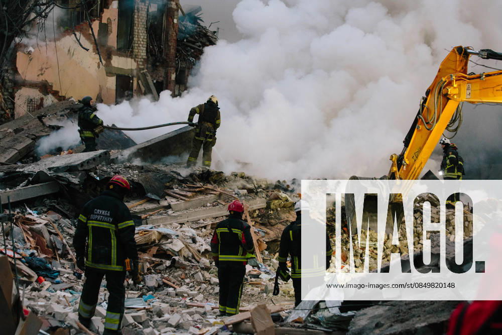 Consequences Of The Attack On Kharkiv Rescue workers are at the site of the rubble clearance in Kharkiv, Ukraine, on March 7, 2026. On the night of March 7, 2026, Russia launches a massive strike on Ukraine. In Kharkiv, at least one missile hits an apartment building, completely destroying one entrance. Surrounding buildings, a school, and cars are also damaged. As of 8:00 a.m. local time, four people are confirmed dead. Search and rescue operations are ongoing. Kharkiv Ukraine