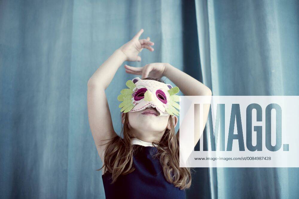 Llittle girl wearing mask