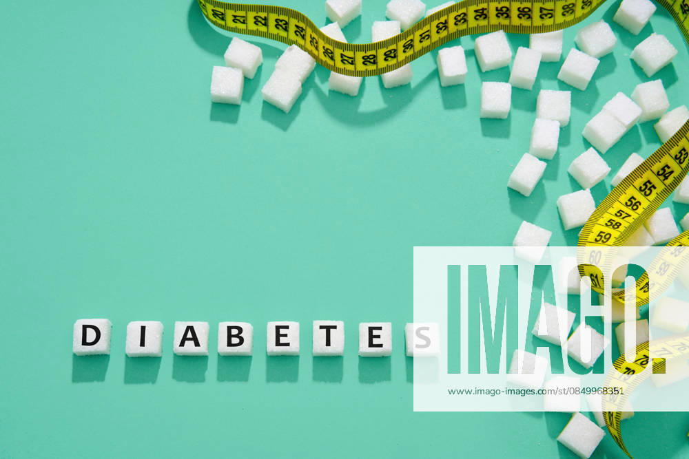 Diabetes-Konzept mit Zucker und Maßband Diabetes-Konzept mit Zucker und Maßband (License=RF)
