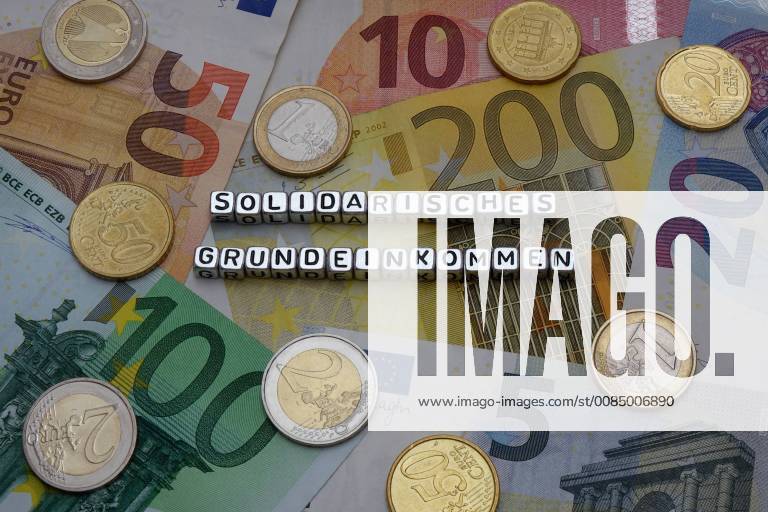 Banknotes and Solidarity Basic Income Banknotes and Solidarity Basic Income 15 08 2018 Borkwalde Brandenburg The words Solidarisches Grundeinkommen are on banknotes