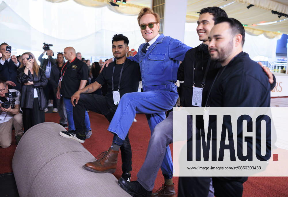 98th Oscars host CONAN O BRIEN and assistants prepare to roll out the Red Carpet at the Dolby Theater in Hollywood ahead of the upcoming Academy Awards which will take place Sunday March 15th. Hollywood USA - ZUMAp124 20260311_zaa_p124_009
