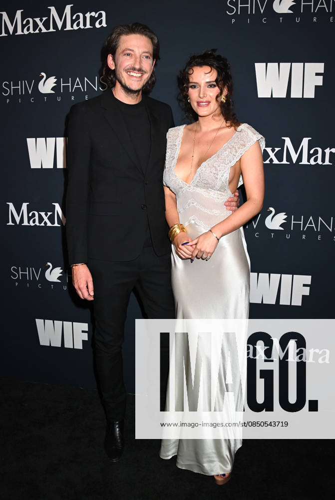 WIF Oscars Nominees Celebration Mark Emma and Bella Thorne arriving at the WIF Oscars Nominees Celebration at Wheelhouse on March 13, 2026 in West Hollywood, California. West Hollywood Private Residence California USA