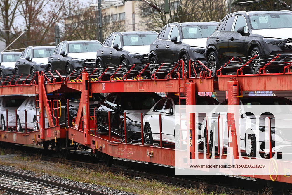 Mercedes new cars,cars are loaded on wagons rail freight traffic,freight traffic,freight train,car loading,new cars,Mercedes cars are transported on freight wagons