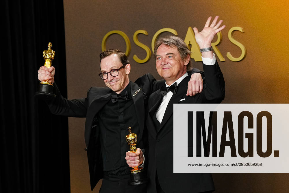 Chris Lavis and Maciek Szczerbowski celebrate in the press photo room after winning the Best Animated Short Film Oscar for The Girl Who Cried Pearls during the 98th annual Academy Awards in the Hollywood section of Los Angeles on Sunday, March 15, 2026. Conan O Brien is hosting the Oscars for the second consecutive year. LAP202603152306 BONNIExCASH