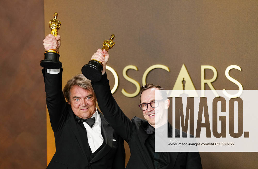 Chris Lavis and Maciek Szczerbowski celebrate in the press photo room after winning the Best Animated Short Film Oscar for The Girl Who Cried Pearls during the 98th annual Academy Awards in the Hollywood section of Los Angeles on Sunday, March 15, 2026. Conan O Brien is hosting the Oscars for the second consecutive year. LAP202603152307 BONNIExCASH
