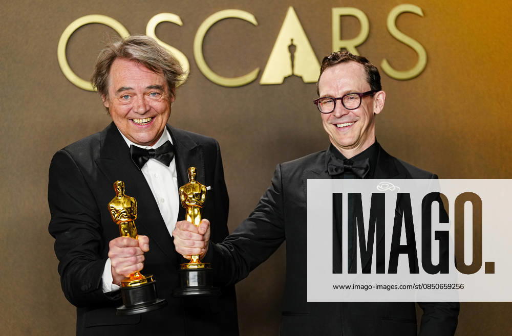 Chris Lavis and Maciek Szczerbowski celebrate in the press photo room after winning the Best Animated Short Film Oscar for The Girl Who Cried Pearls during the 98th annual Academy Awards in the Hollywood section of Los Angeles on Sunday, March 15, 2026. Conan O Brien is hosting the Oscars for the second consecutive year. LAP202603152308 BONNIExCASH