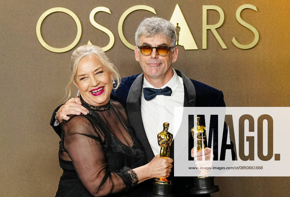 Tamara Deverell and Shane Vieau celebrate in the press photo room after winning the Best Production Design Oscar for Frankenstein during the 98th annual Academy Awards in the Hollywood section of Los Angeles on Sunday, March 15, 2026. LAP20260315367 BONNIExCASH