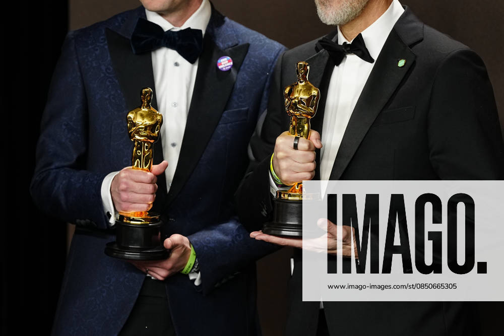 Conall Jones and Joshua Seftel celebrate in the press photo room after winning the Best Documentary Short Film Oscar for All the Empty Rooms during the 98th annual Academy Awards in the Hollywood section of Los Angeles on Sunday, March 15, 2026. LAP20260315373 BONNIExCASH