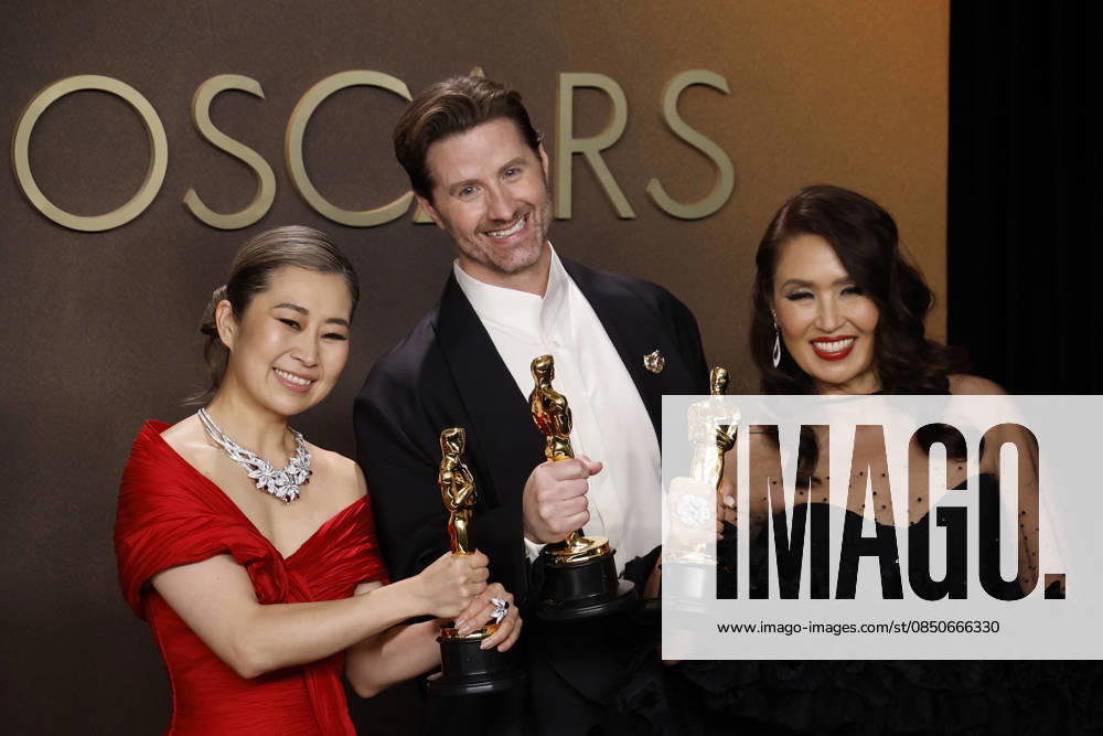 (L-R) Maggie Kang, Chris Appelhans and Michelle L. M. Wong in the press room of the 98th Annual Academy Awards on Sunday March 15, 2026 at the Dolby Theater in Hollywood, California. BURT HARRIS BNS PI Hollywood USA - ZUMAp124 20260315_zaa_p124_239