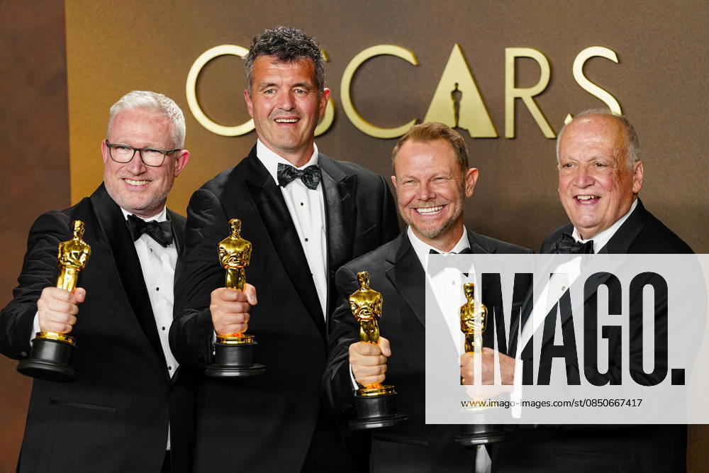 Richard Baneham, Joe Letteri, Daniel Barrertt, and Eric Saindon celebrate in the press photo room after winning the Best Visual Effects Oscar for Avatar: Fire and Ash during the 98th annual Academy Awards in the Hollywood section of Los Angeles on Sunday, March 15, 2026. LAP20260315374 BONNIExCASH