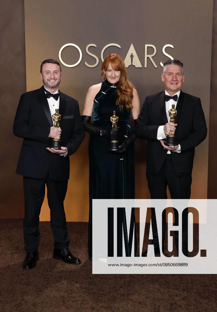 (L-R) Mike Hill, Cliona Furey, and Jordan Samuel in the press room of the 98th Annual Academy Awards on Sunday March 15, 2026 at the Dolby Theater in Hollywood, California. BURT HARRIS BNS PI Hollywood USA - ZUMAp124 20260315_zaa_p124_275